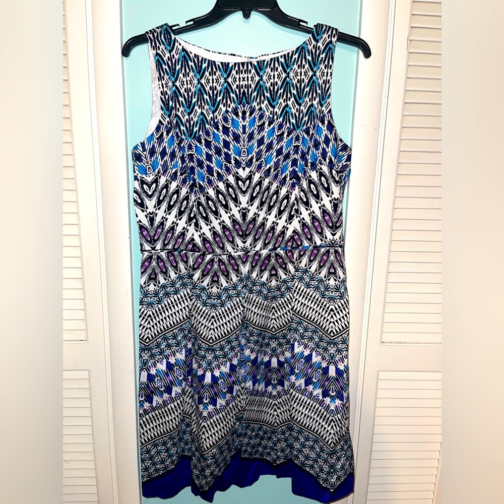 NWOT Covington size 16 dress. Beautiful purple and blues on black and white.